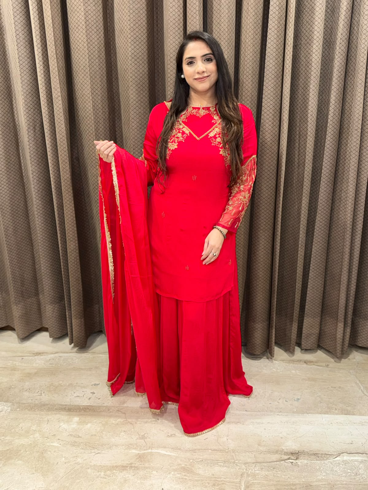 Red Sharara set with Designer neck and  handwork