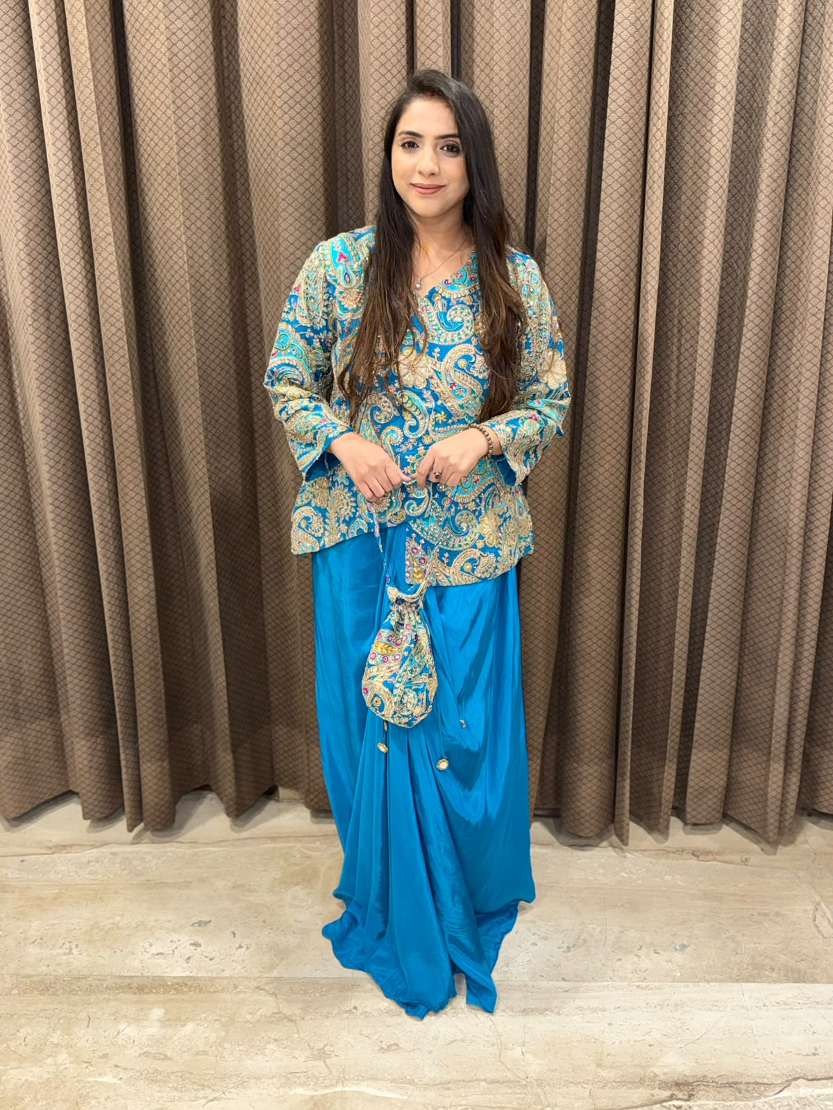 Blue Designer handwork Drape skirt set with potli